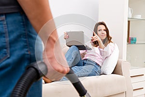 Young family doing cleaning at home