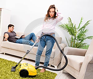 Young family doing cleaning at home