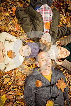 Young family doing a head circles