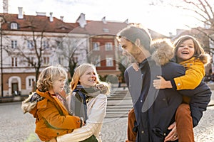 Young family enjoying their day in a city