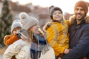 Young family enjoying their day in a city