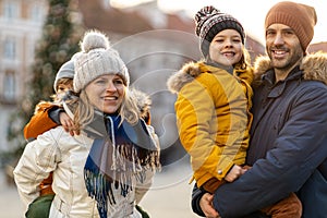 Young family enjoying their day in a city