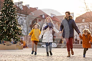 Young family enjoying their day in a city