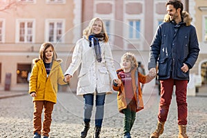 Young family enjoying their day in a city