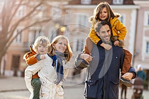 Young family enjoying their day in a city