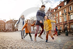 Young family enjoying their day in a city