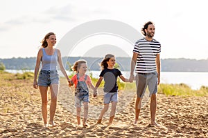 Young family enjoying time at the beach
