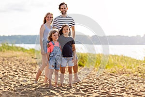 Young family enjoying time at the beach