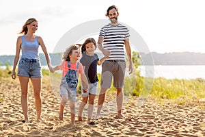 Young family enjoying time at the beach