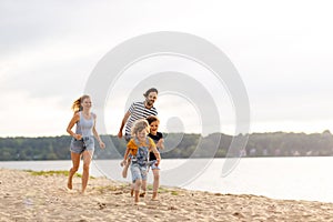 Young family enjoying time at the beach