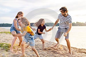 Young family enjoying time at the beach