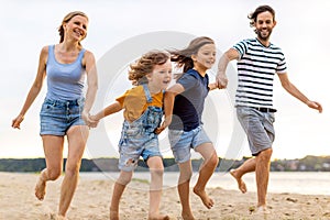 Young family enjoying time at the beach