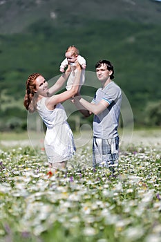 Young family on field