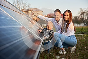 Young family getting to know alternative energy photo