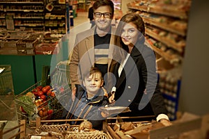 Young family in a grocery store