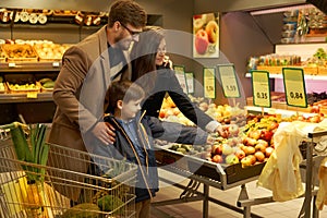 Young family in a grocery store