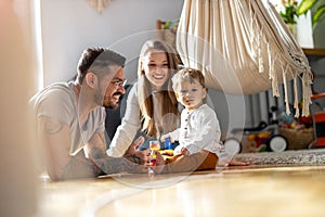 Young family having fun together at home