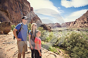 Young family hiking in beautiful Red Rock Canyon in Southwest USA