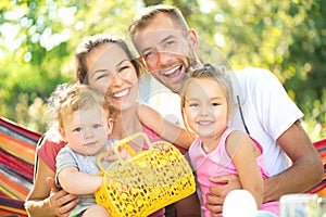 Young family with little children outdoors