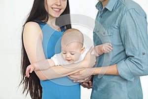 Young family with little son at home