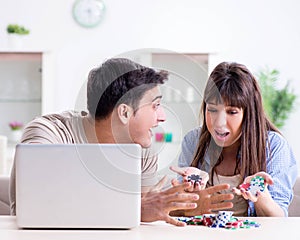 Young family losing money in online casino