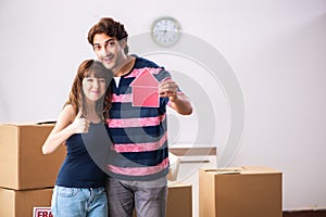 The young family moving to new house apartment