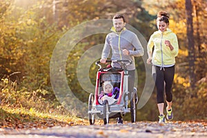 Young family running