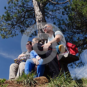 Young family in the summer nature