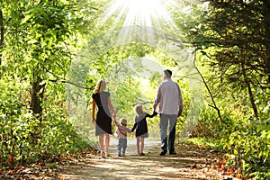 Young family walk together