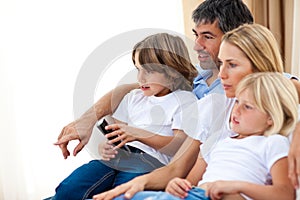 Young Family watching TV