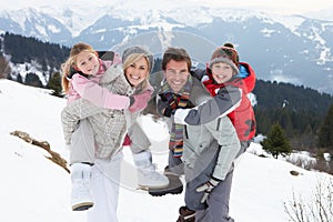 Young Family On Winter Vacation