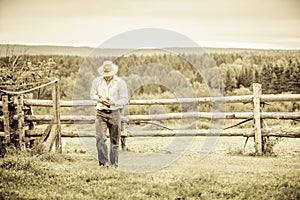 Young Farmer and a Chicken