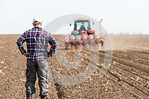 Young farmer on farmland