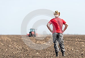 Young farmer on farmland