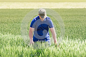 Young farmer in a field