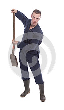 Young farmer with shovel isolated