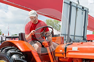 Young farmer in tractor