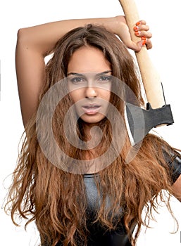 Young fashion beautiful woman with axe i
