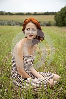 Young fashion girl at field