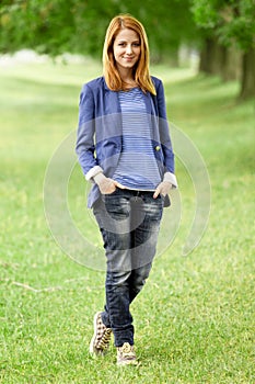 Young fashion girl at spring outdoor.