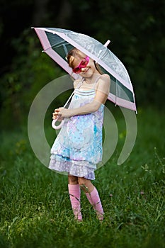 Young fashion girl with umbrella