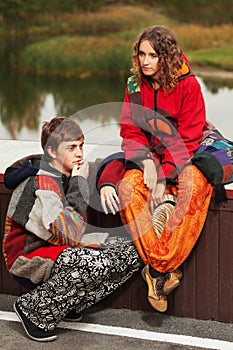 Young fashion hipster couple in love outdoor