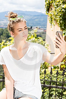 Young fashionable girl using smartphone.