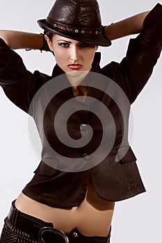 Young fashionable model with black hat