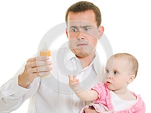 A young father with a baby on a white background.