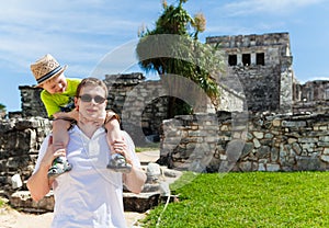 Young father with his son sightseeing photo