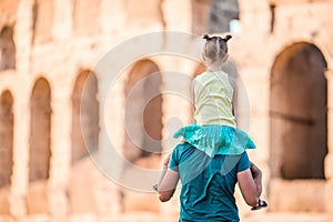 Young father and little girl background Colosseum, Rome, Italy