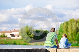 Young father and little girl enjoying beautiful views outdoors in Europe