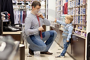 Young father and son make shopping