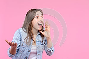 Young female adult woman isolated on pink background